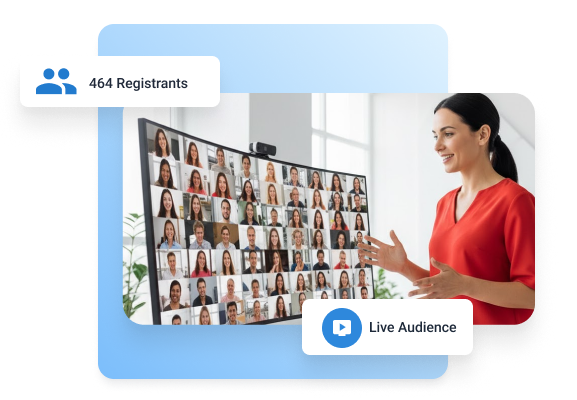 Woman presenting to a large online audience displayed on a screen, representing scalable webinar hosting for thousands of live attendees.