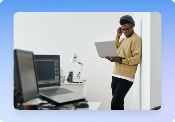 Entrepreneur managing her automated online course sales and webinar funnels from a laptop.